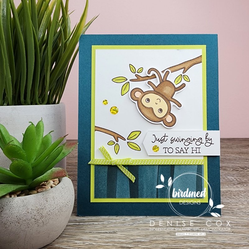 Photo showing the Stampin' Up! Little Monkey card standing on a table next to a plant