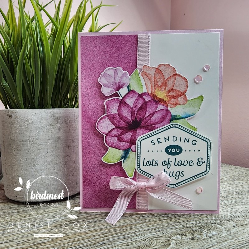 Photo of the Heartfelt Hexagon card standing on a table next to a plant