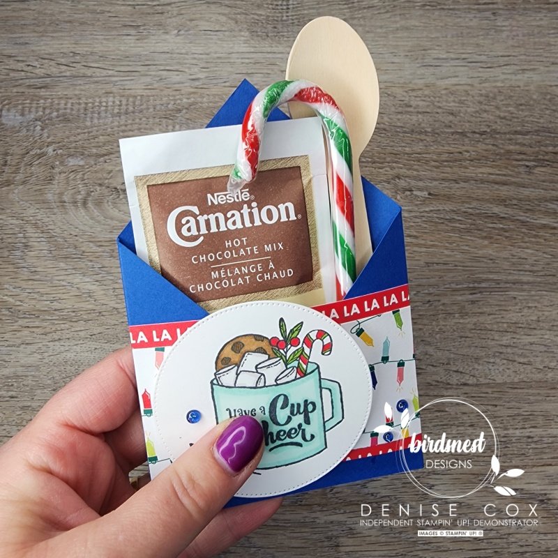 Photo of hand holding the Stampin' Up! Gift of Giving Hot Chocolate treat holder