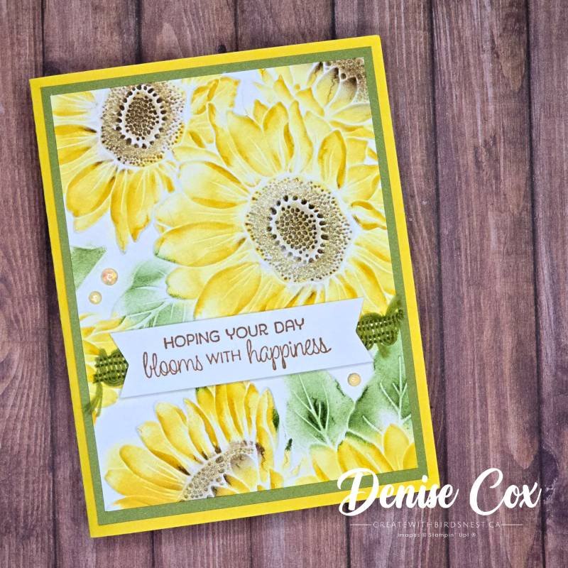 Handmade sunflower card with yellow inked embossed cardstock, layered panels, and a sentiment strip showing an inking technique on embossed paper.