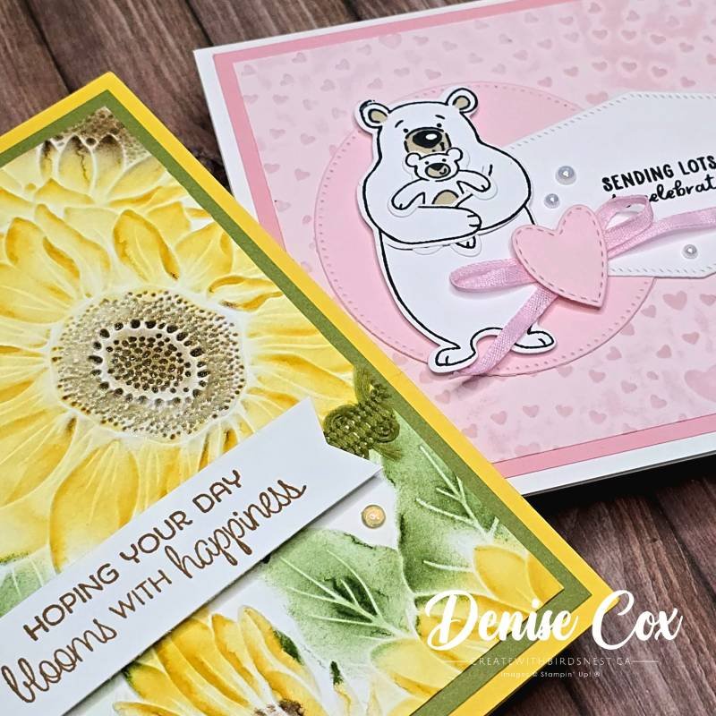 Close-up of two handmade cards showing inked embossed cardstock details, including a sunflower design and a pink bear card with layered textures and embellishments.