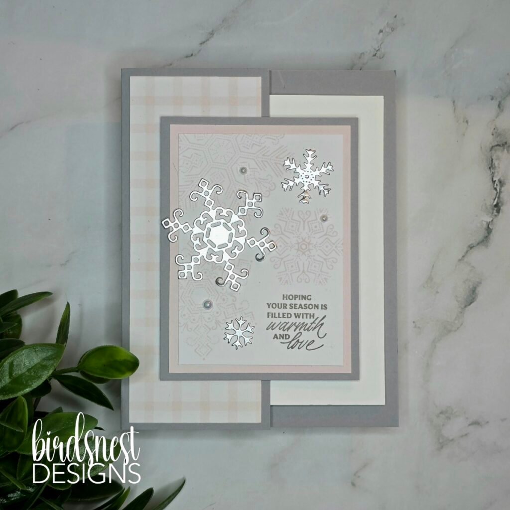 Elegant Christmas fun fold card with silver snowflakes and soft pink accents.